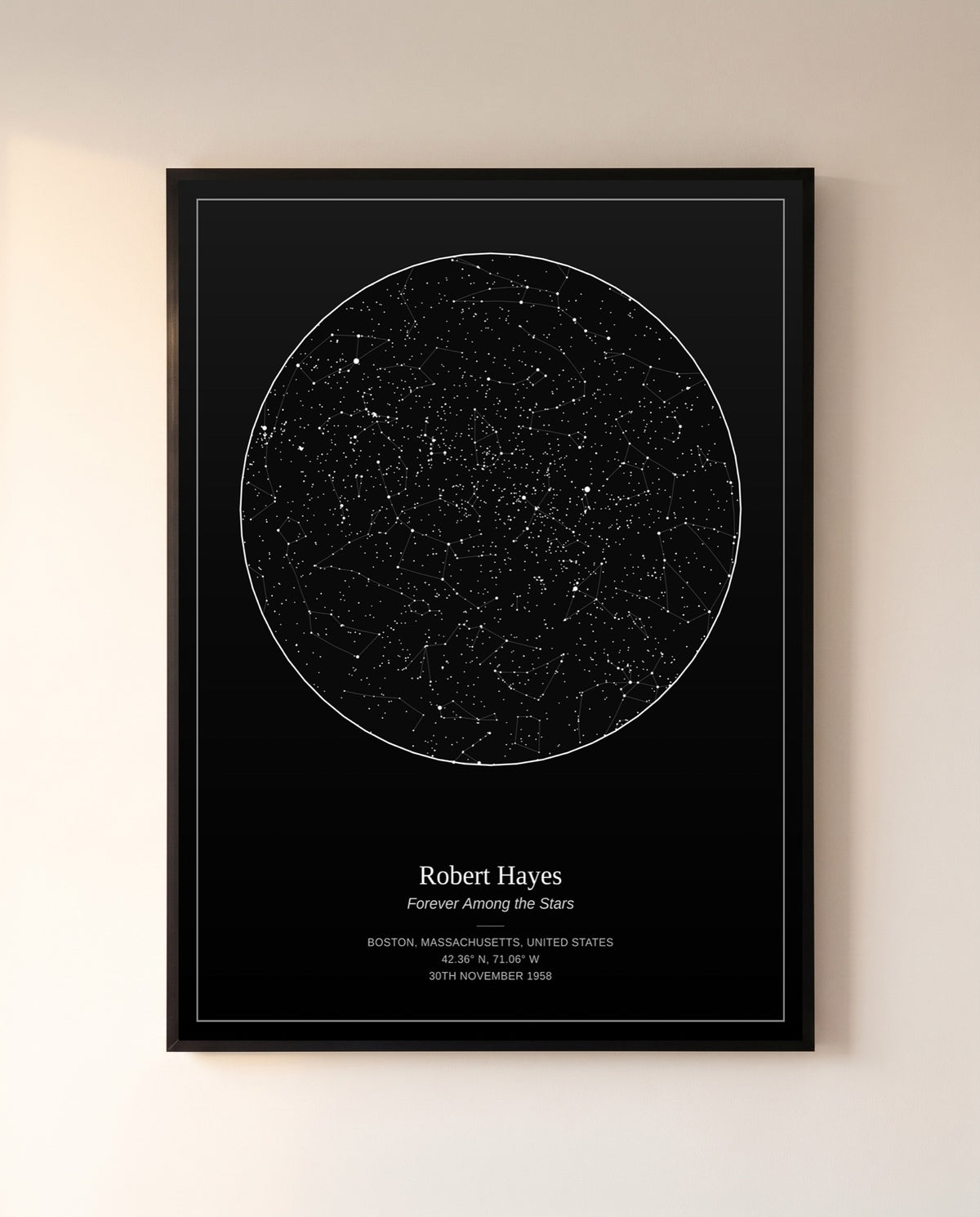 Personalized memorial star map of the night sky over Boston on the night Robert Hayes was born, in a black metal frame