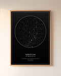 Personalized star map of the night sky over Charleston on a couple's wedding night, in a natural oak frame